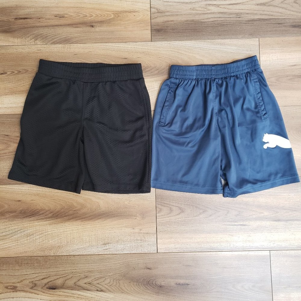 Two pairs of size 6 boys gym shorts